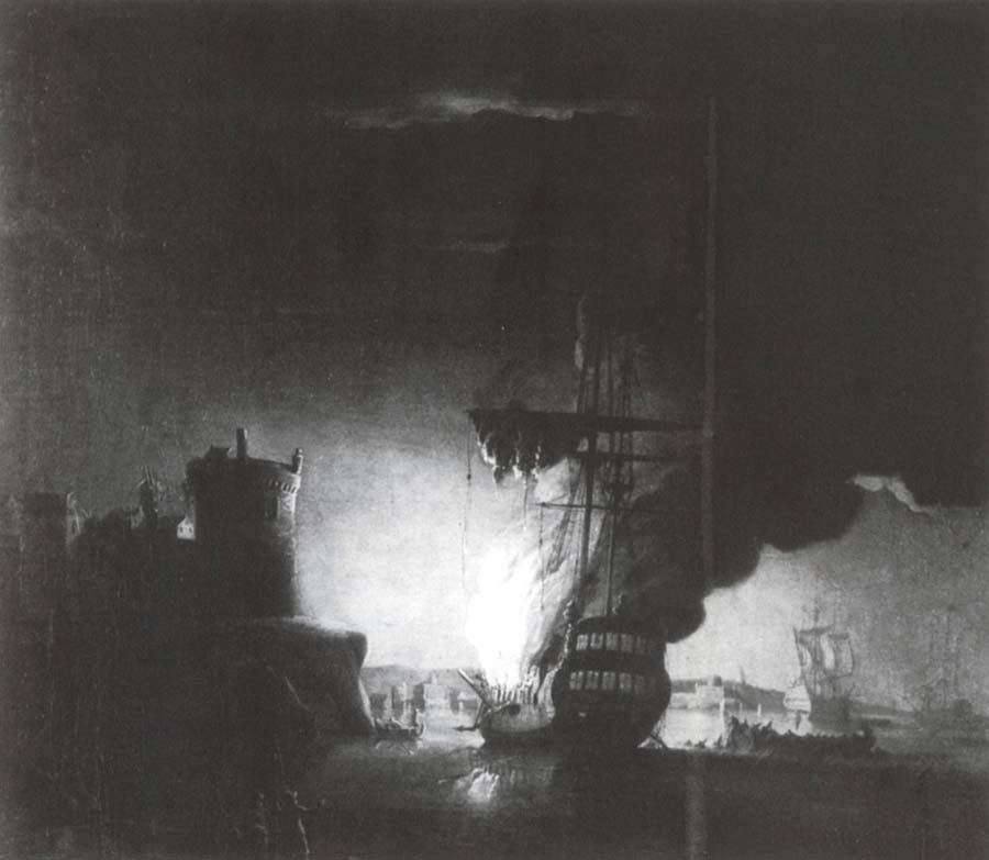 A ship on fire at night